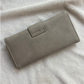 Billetera de mujer gris